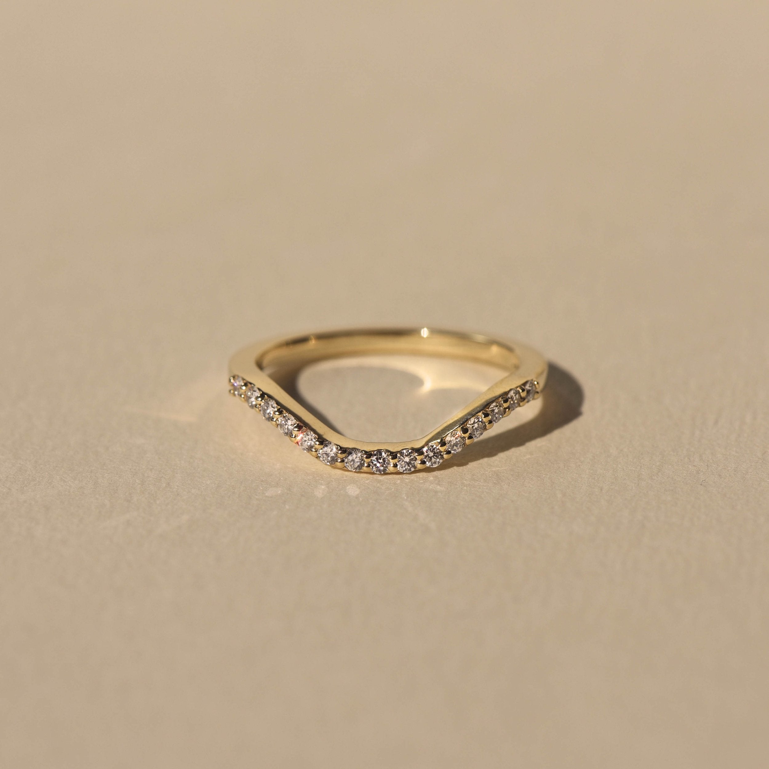 0.25 TCW Round Cut Delicate Curved Lab Grown Wedding Band