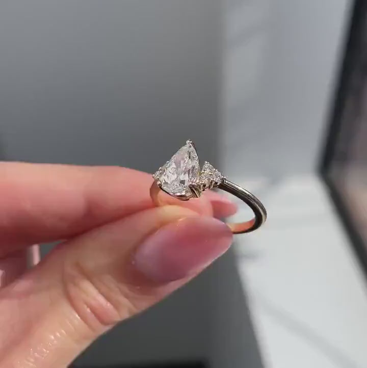 1.50–3.50 CT pear cut lab grown CVD diamond cluster engagement ring with intricate design and sparkling brilliance