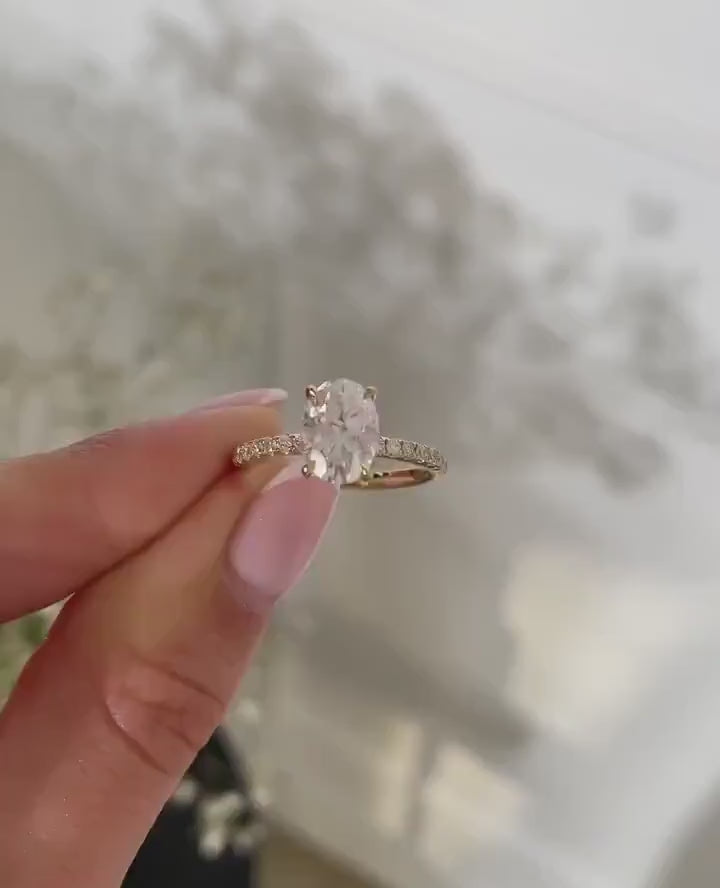 Oval CVD diamond hidden halo engagement ring with pave setting, 1.50 to 3.50 CT lab diamond, set in a sleek polished band


