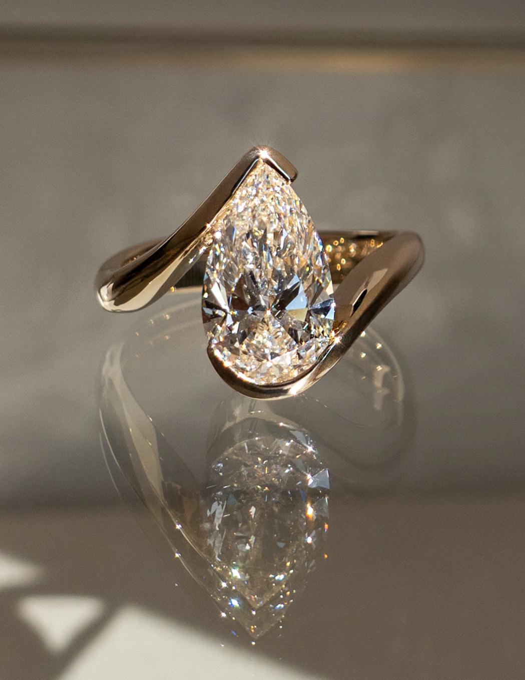1.0 - 2.5 CT Pear Shaped Lab Grown Diamond Bypass Style Engagement Ring