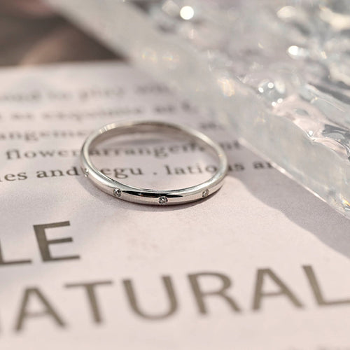 0.08 TCW Round CVD Diamond Flush Wedding Band - Camila Brown